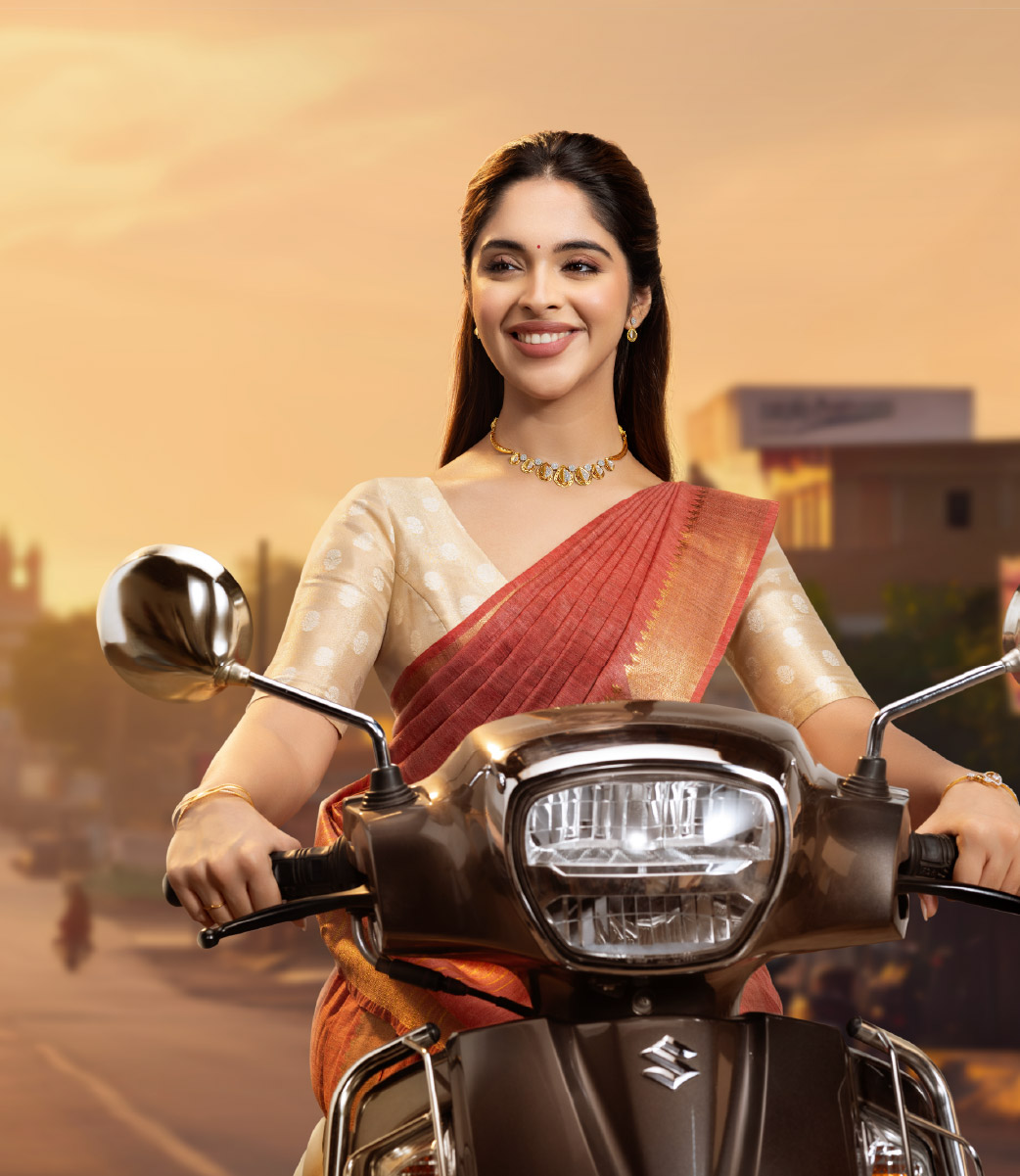 VPJ Jewellery campaign featuring a woman wearing jewellery on a scooter